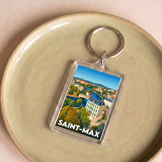 Porte-clés souvenir de la ville de Saint-Max avec une illustration stylisée.