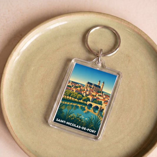 Porte-clés souvenir de la ville de Saint-Nicolas-de-Port avec une illustration stylisée de sa basilique.