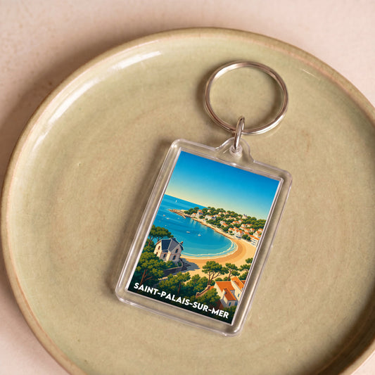 Porte-clés souvenir de la ville de Saint-Palais-sur-Mer avec une illustration stylisée de son littoral.