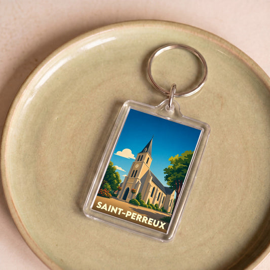 Porte-clés souvenir de la ville de Saint-Perreux avec une illustration stylisée de son église.