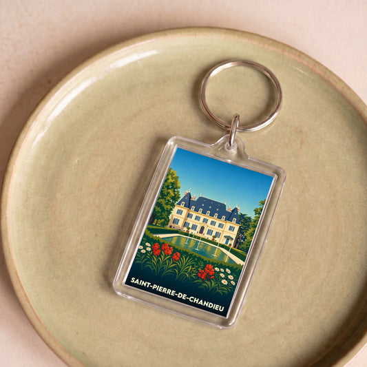 Porte-clés souvenir de la ville de Saint-Pierre-de-Chandieu avec une illustration stylisée de son château.