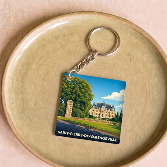 Porte-clés souvenir de la ville de Saint-Pierre-de-Varengeville avec une illustration stylisée de son château.