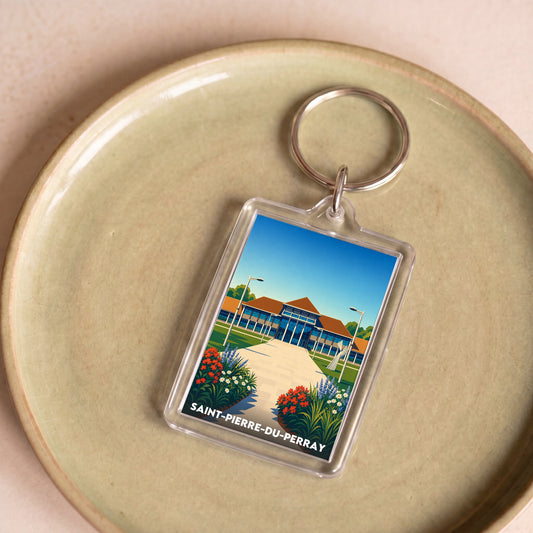 Porte-clés souvenir de la ville de Saint-Pierre-du-Perray avec une illustration stylisée.
