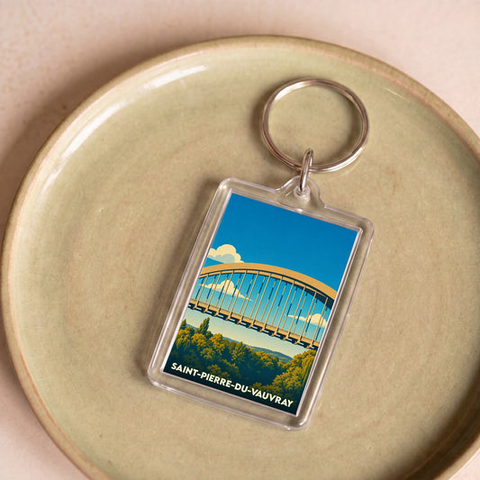 Porte-clés souvenir de la ville de Saint-Pierre-du-Vauvray avec une illustration stylisée de son pont.