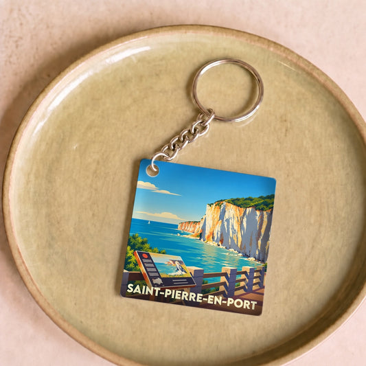 Porte-clés souvenir de la ville de Saint-Pierre-en-Port avec une illustration stylisée des falaises.