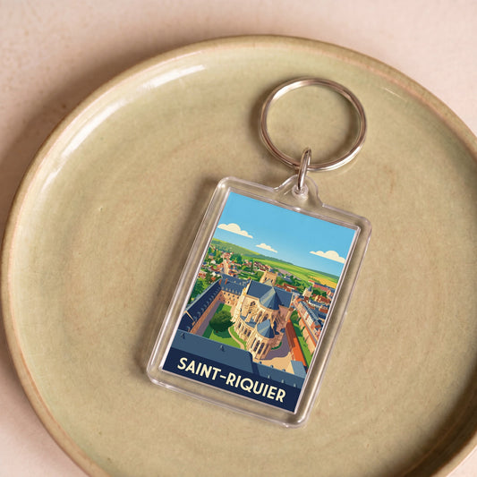 Porte-clés souvenir de la ville de Saint-Riquier avec une illustration stylisée.
