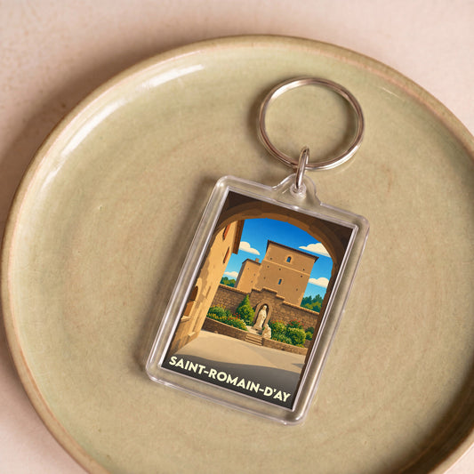 Porte-clés souvenir de la ville de Saint-Romain-d'Ay avec une illustration stylisée.
