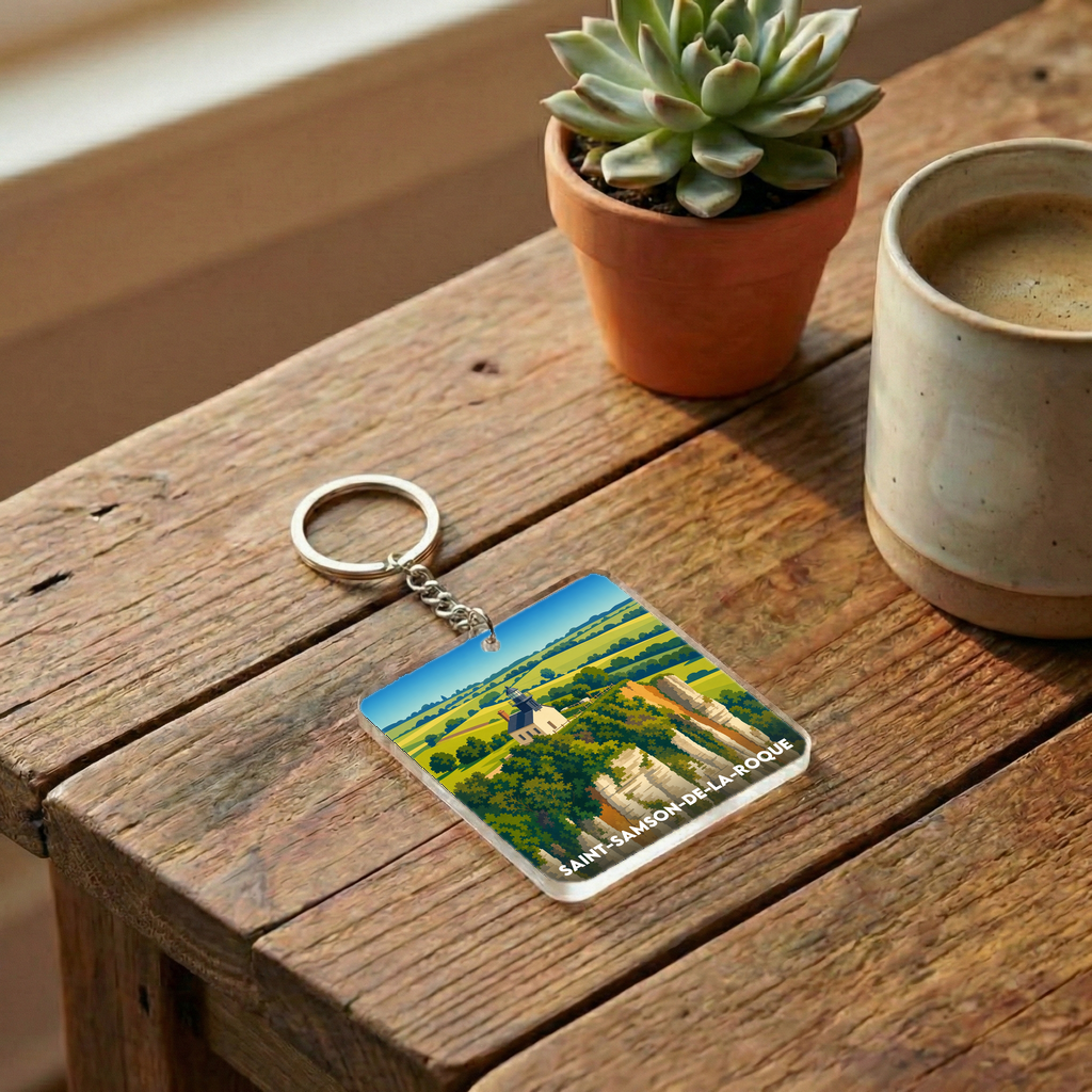 Porte-clés souvenir de la ville de Saint-Samson-de-la-Roque avec une illustration stylisée de son paysage.