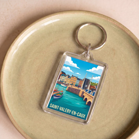 Porte-clés souvenir de la ville de Saint-Valery-en-Caux avec une illustration stylisée de son port.