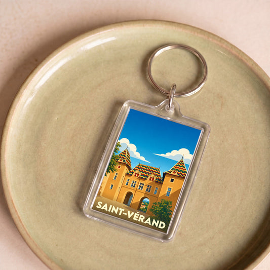 Porte-clés souvenir de la ville de Saint-Vérand avec une illustration stylisée de son château.