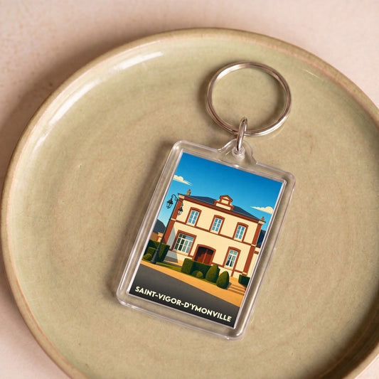 Porte-clés souvenir de la ville de Saint-Vigor-d'Ymonville avec une illustration stylisée de sa mairie.