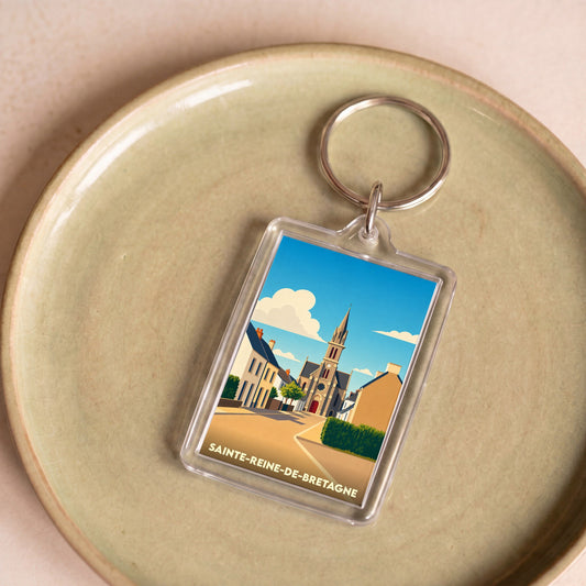 Porte-clés souvenir de la ville de Sainte-Reine-de-Bretagne avec une illustration stylisée.