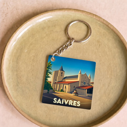 Porte-clés souvenir de la ville de Saivres avec une illustration stylisée de son église.