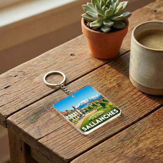 Porte-clés souvenir de la ville de Sallanches avec une illustration stylisée.