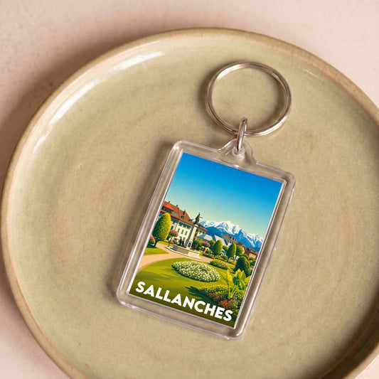 Porte-clés souvenir de la ville de Sallanches avec une illustration stylisée.