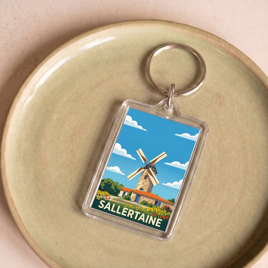 Porte-clés souvenir de la ville de Sallertaine avec une illustration stylisée d'un moulin.