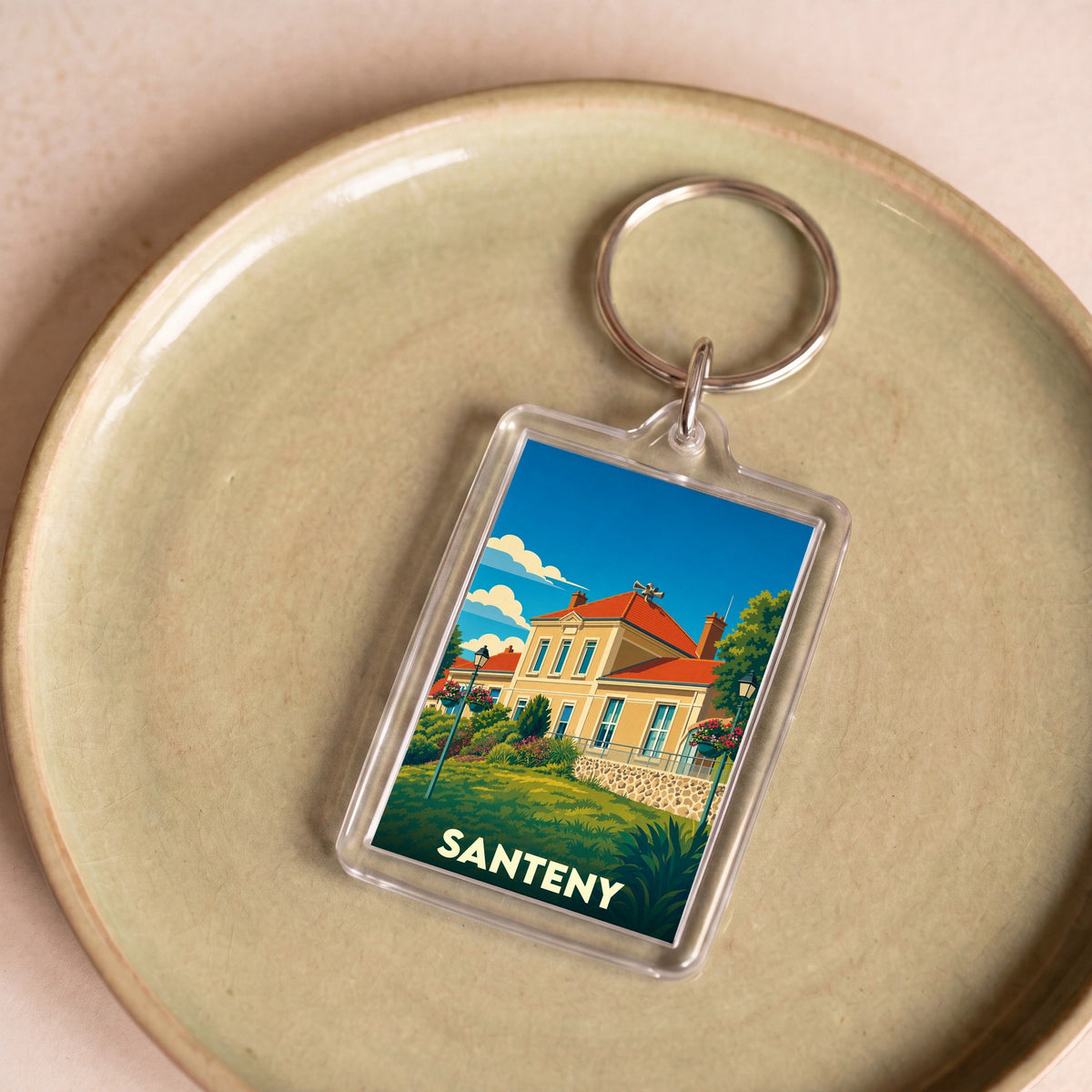 Porte-clés souvenir de la ville de Santeny avec une illustration stylisée.