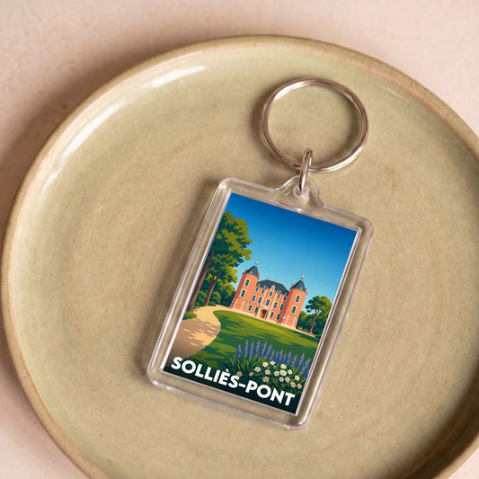 Porte-clés souvenir de la ville de Solliès-Pont avec une illustration stylisée de son château.