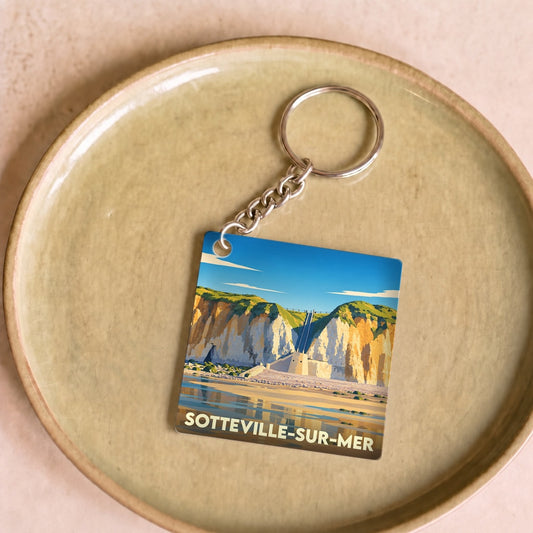 Porte-clés souvenir de Sotteville-sur-Mer avec une illustration stylisée de ses falaises.
