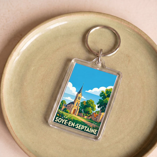 Porte-clés souvenir de la ville de Soye-en-Septaine avec une illustration stylisée.