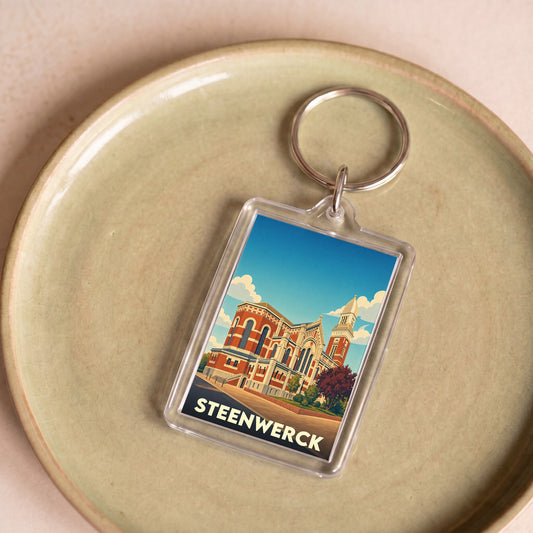 Porte-clés souvenir de la ville de Steenwerck avec une illustration stylisée de son église.