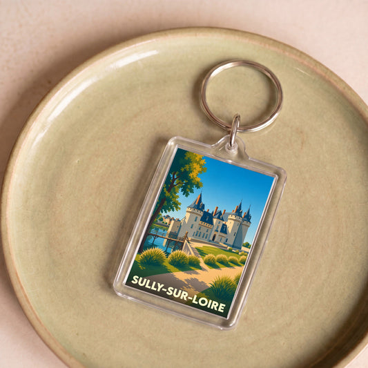 Porte-clés souvenir de la ville de Sully-sur-Loire avec une illustration stylisée de son château.