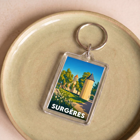 Porte-clés souvenir de la ville de Surgères avec une illustration stylisée.