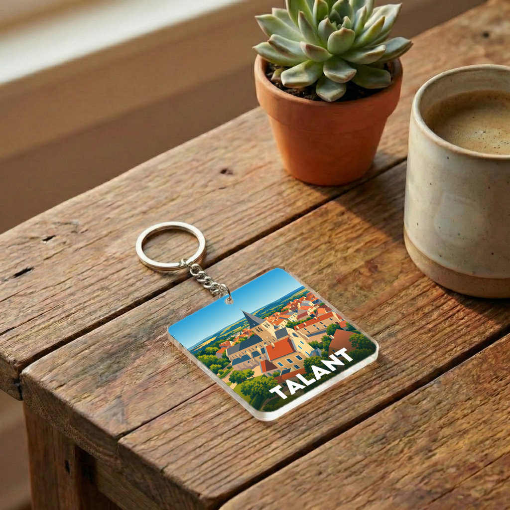 Porte-clés souvenir de la ville de Talant avec une illustration stylisée.