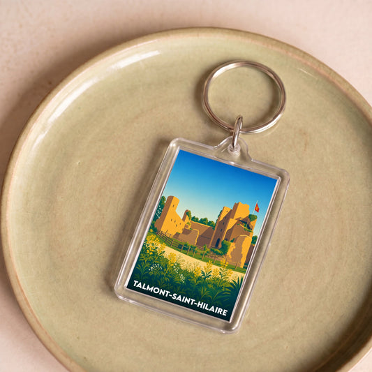 Porte-clés souvenir de Talmont-Saint-Hilaire avec une illustration stylisée du château médiéval.