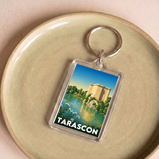 Porte-clés souvenir de la ville de Tarascon avec une illustration stylisée.