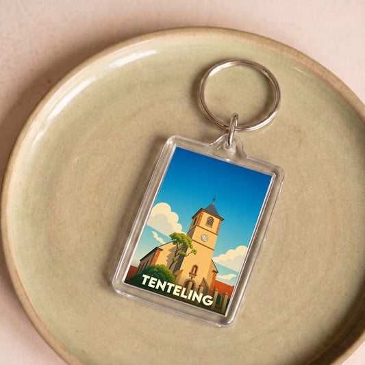 Porte-clés souvenir de la ville de Tenteling avec une illustration stylisée de son église.