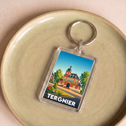 Porte-clés souvenir de la ville de Tergnier avec une illustration stylisée.