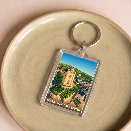 Porte-clés souvenir de la ville de Terrasson-Lavilledieu avec une illustration stylisée.