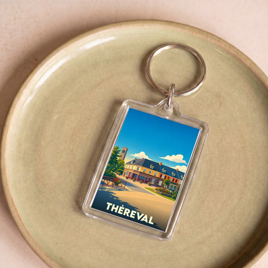 Porte-clés souvenir de la ville de Thèreval avec une illustration stylisée.