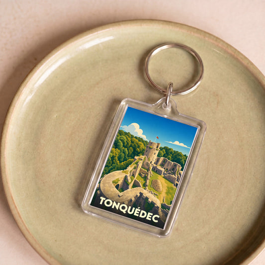 Porte-clés souvenir de la ville de Tonquédec avec une illustration stylisée de son château médiéval.