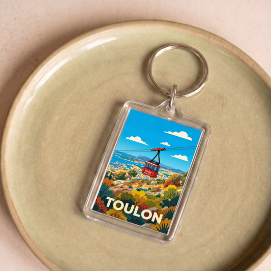 Porte-clés souvenir de la ville de Toulon avec une illustration stylisée du téléphérique.