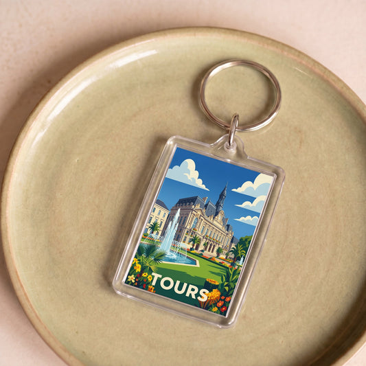 Porte-clés souvenir de la ville de Tours avec une illustration stylisée.