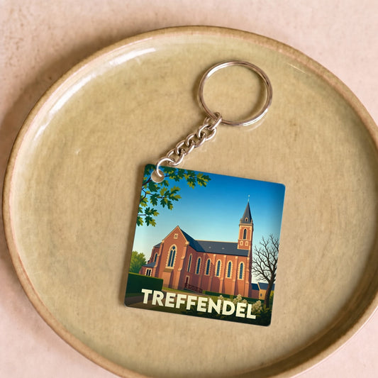 Porte-clés souvenir de la ville de Treffendel avec une illustration stylisée de son église.