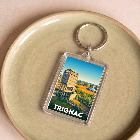 Porte-clés souvenir de la ville de Trignac avec une illustration stylisée de son patrimoine industriel.
