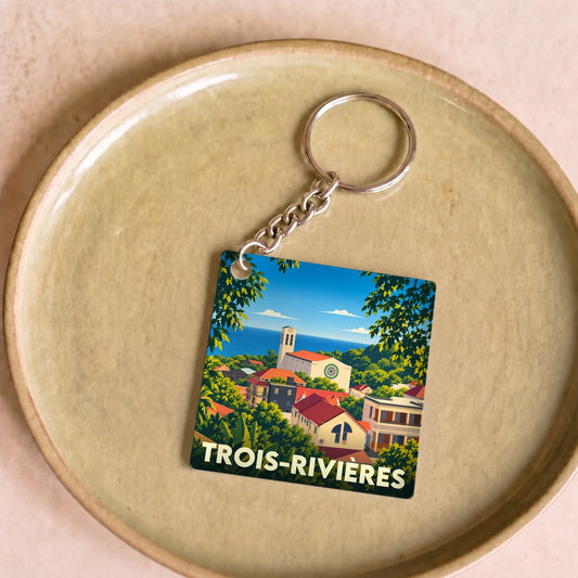 Porte-clés souvenir de la ville de Trois-Rivières avec une illustration stylisée et colorée.