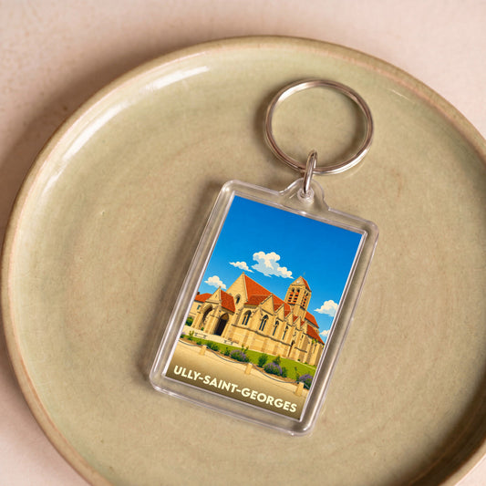 Porte-clés souvenir de la ville d'Ully-Saint-Georges avec une illustration stylisée de son église.
