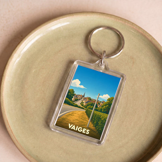 Porte-clés souvenir de la ville de Vaiges avec une illustration stylisée.