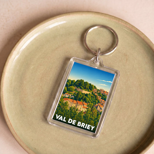Porte-clés souvenir de la ville de Val de Briey avec une illustration stylisée.