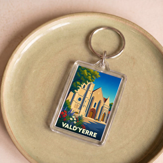 Porte-clés souvenir de la ville de Vald'Yerre avec une illustration stylisée de son église.