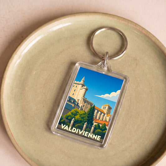 Porte-clés souvenir de la ville de Valdivienne avec une illustration stylisée.