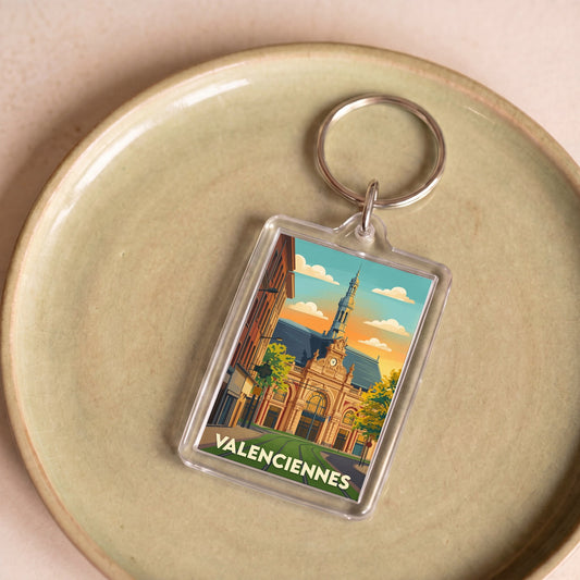 Porte-clés souvenir de la ville de Valenciennes avec une illustration stylisée.