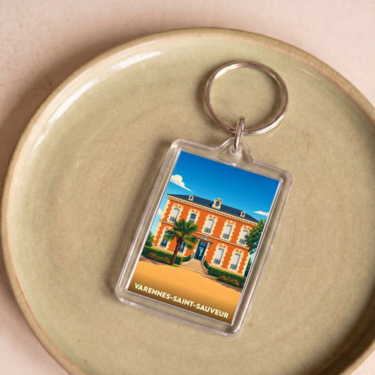 Porte-clés souvenir de la ville de Varennes-Saint-Sauveur avec une illustration stylisée.