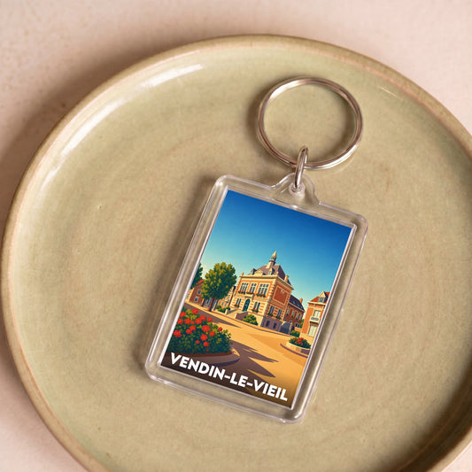 Porte-clés souvenir de la ville de Vendin-le-Vieil avec une illustration stylisée.