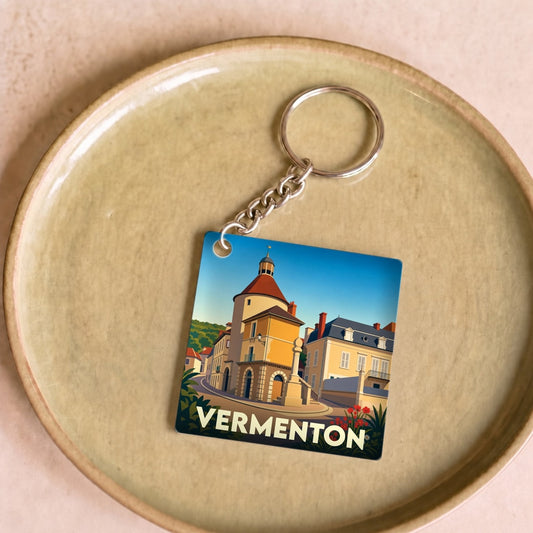 Porte-clés souvenir de la ville de Vermenton avec une illustration stylisée d'un monument historique.