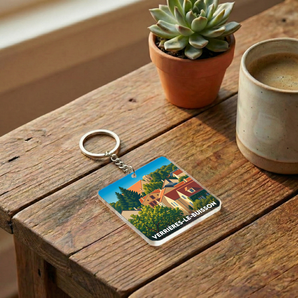 Porte-clés souvenir de la ville de Verrières-le-Buisson avec une illustration stylisée de ses maisons.